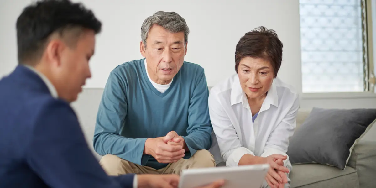 Clients reviewing benefit options together